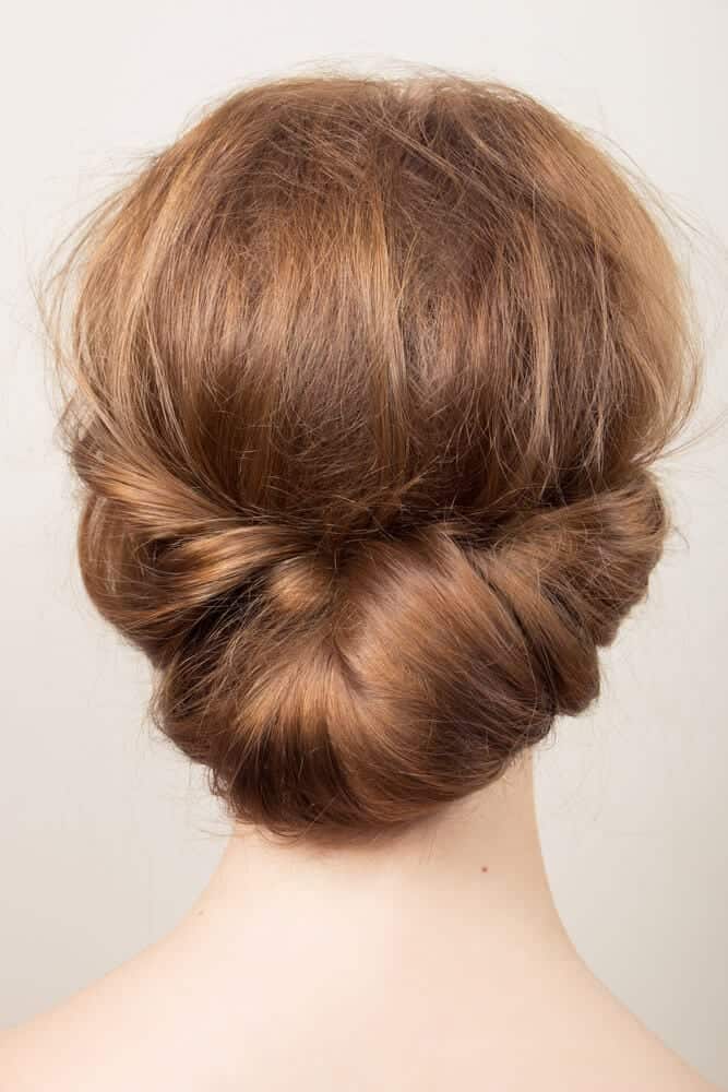 7 Easy Updos You Can Wear To Any Holiday Party