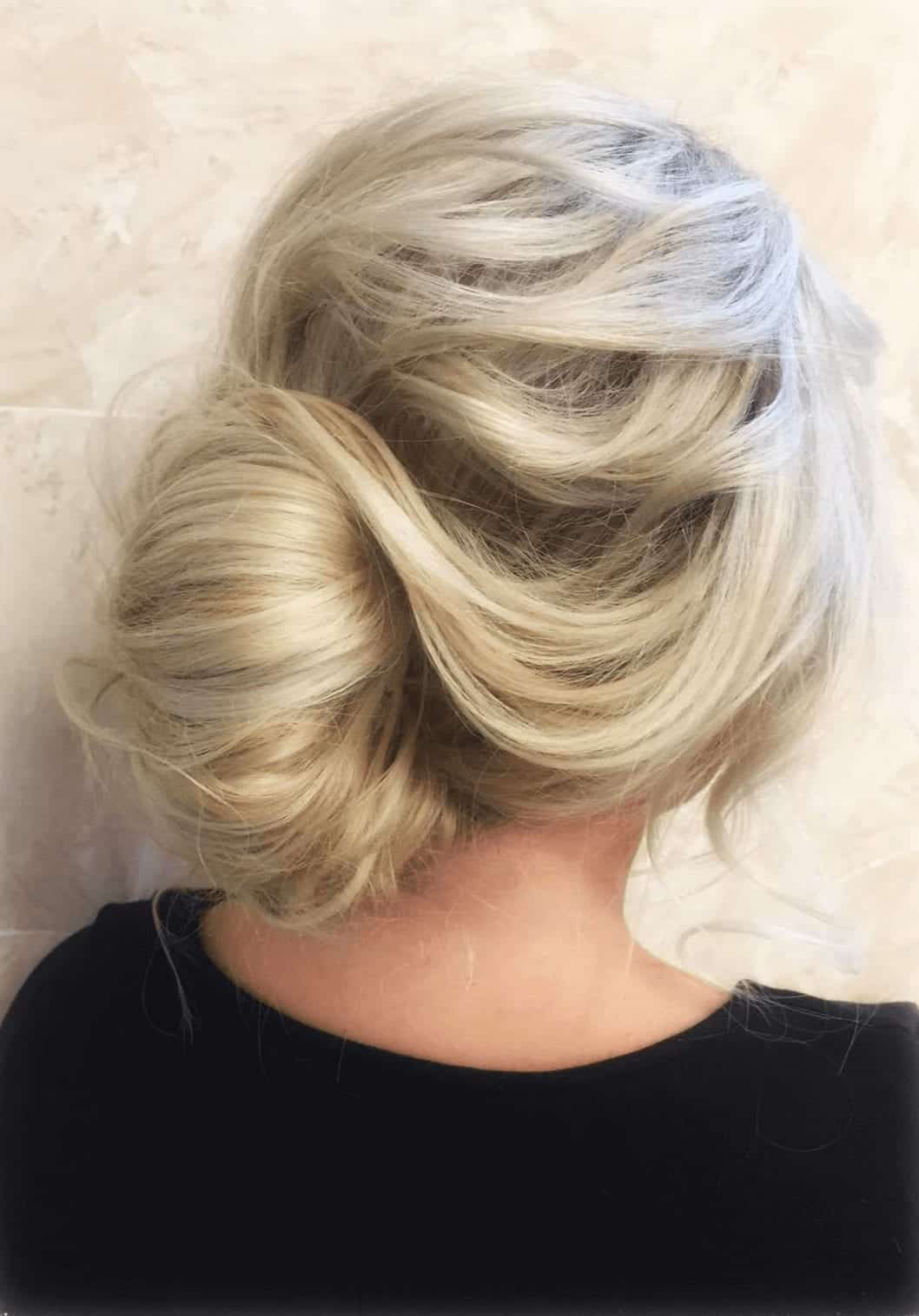 10 Pictures That Prove The Banana Bun Will Be Your New Favorite Hairstyle