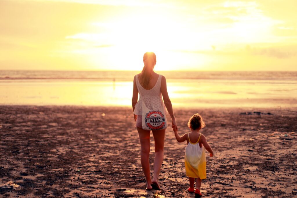 mom and daughter at beach