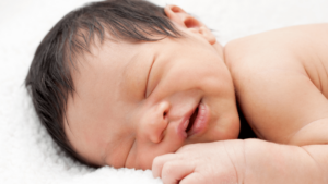 Why do babies smile in their sleep: the science behind infant dreaming