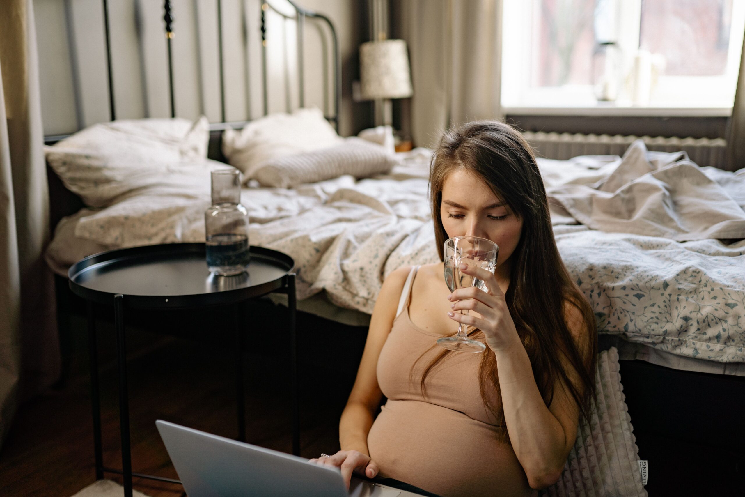 pregnant mom drinking water